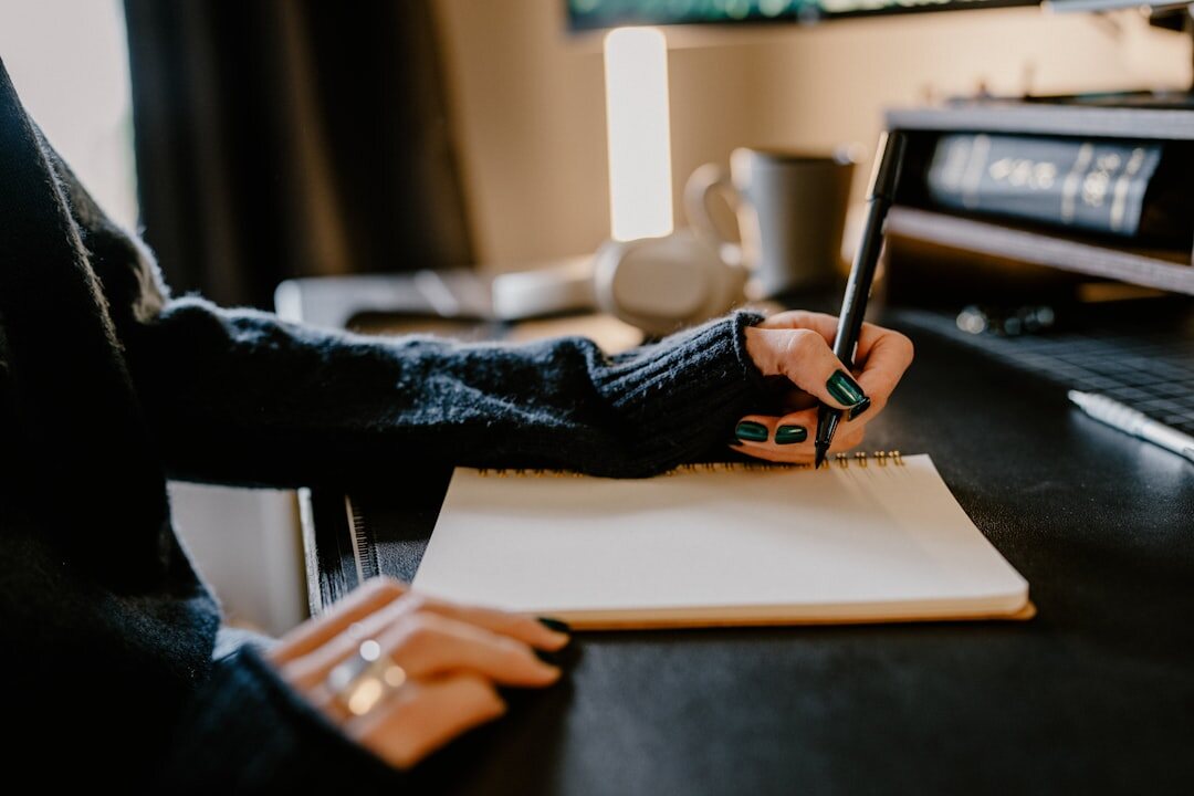 person preparing notes for interview