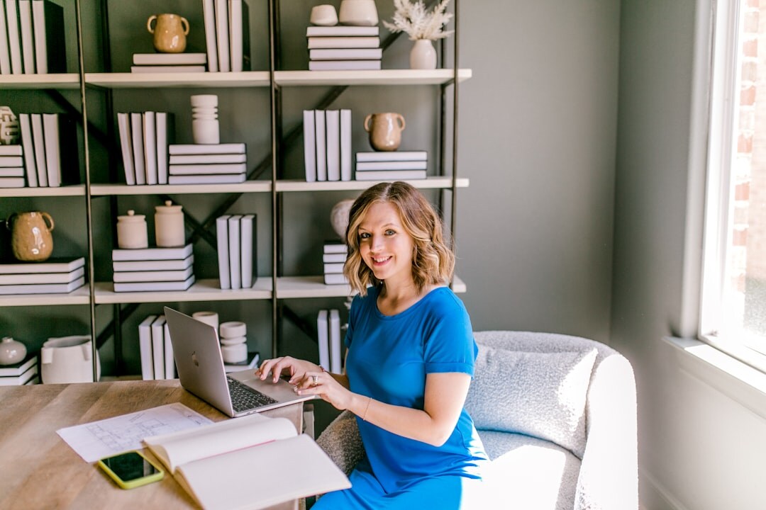 blogger at desk with laptop