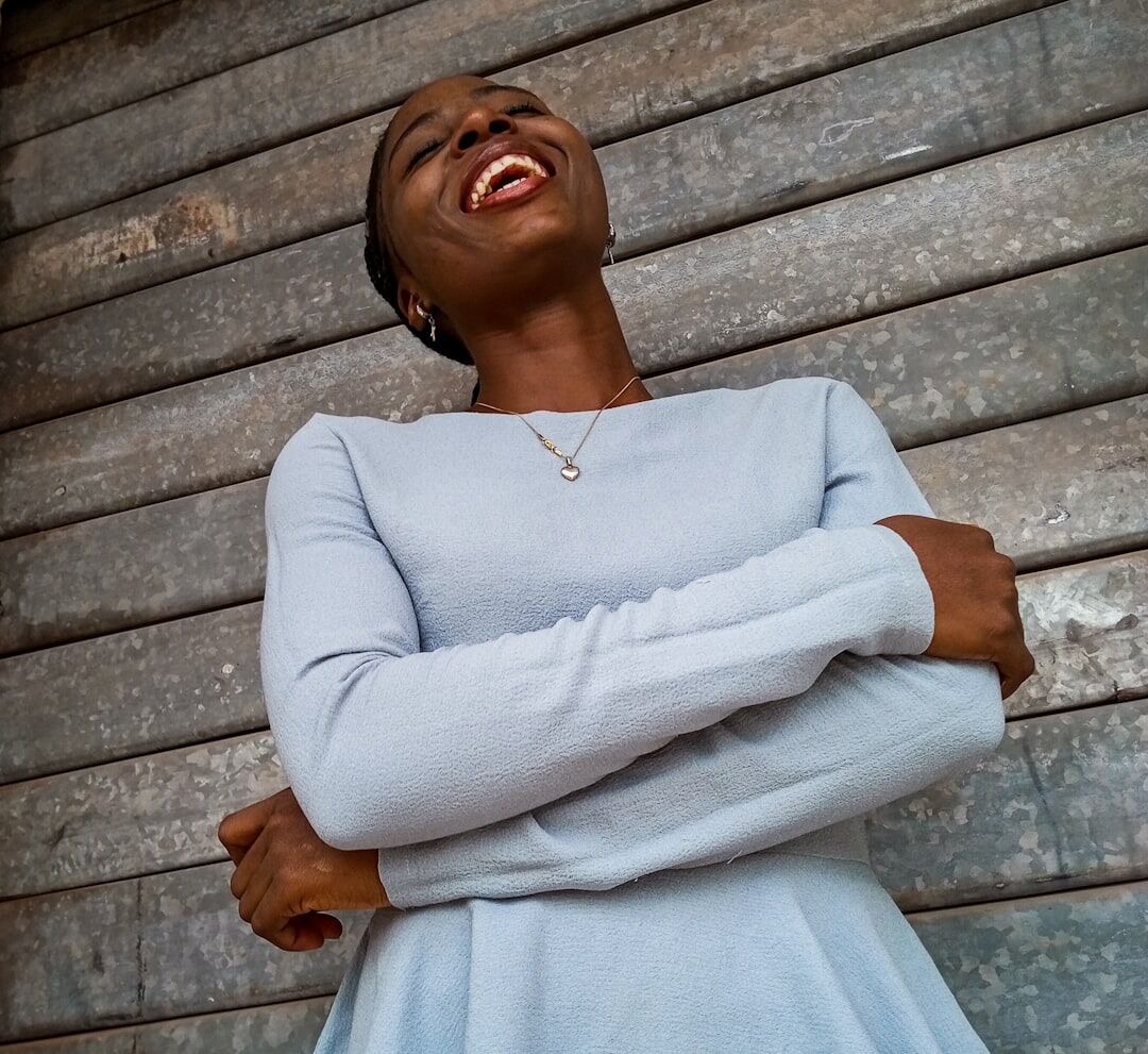 Portrait of a smiling young woman with short hair